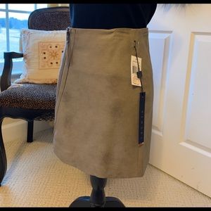 Faux Leather asymmetric zip skirt. NWT Sz 6
